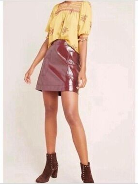 Anthropologie Maeve faux leather mini skirt in a rich burgundy hue 0